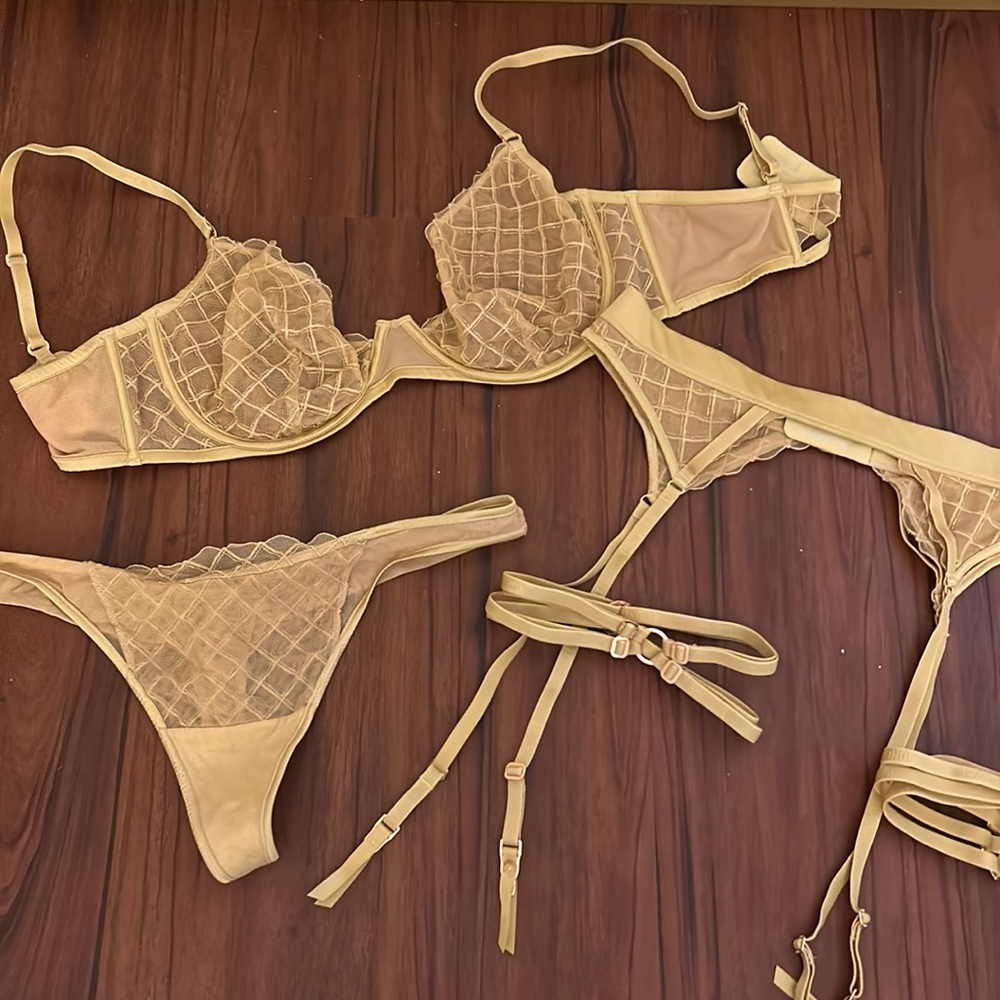 Lounge gold bra and panty set. Size 36F. Large thong panty.